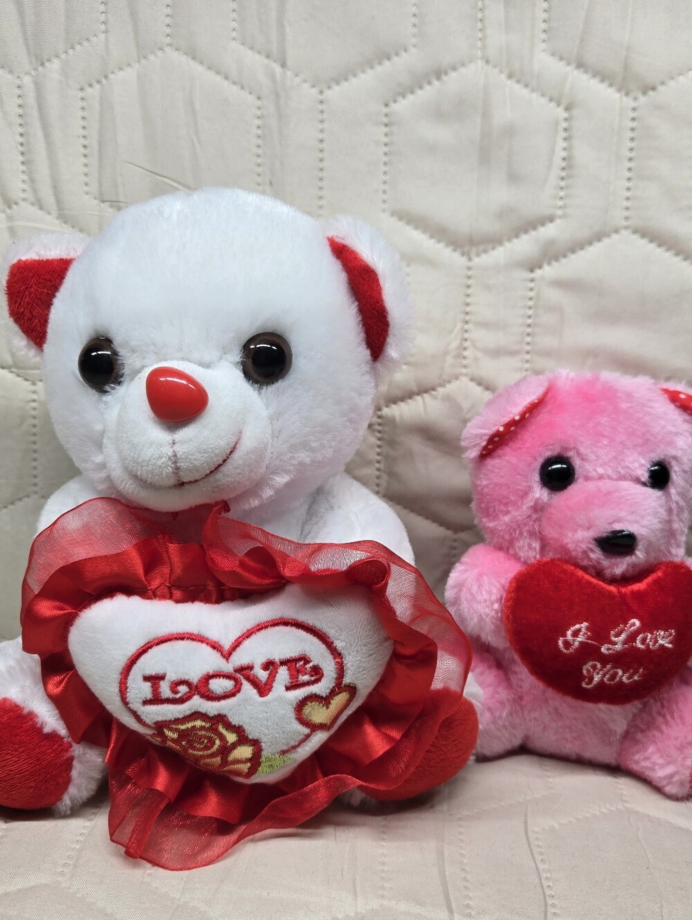 Valentine's Day teddy bears, white and pink bear holding hearts